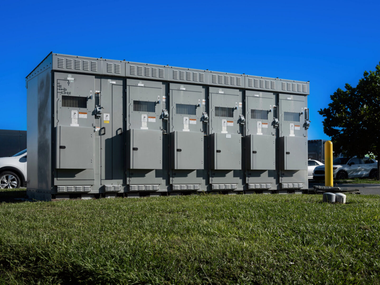 Row of gray outdoor electrical cabinets